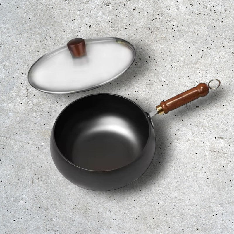 Okinawa ® Sartén de hierro con mango de madera.